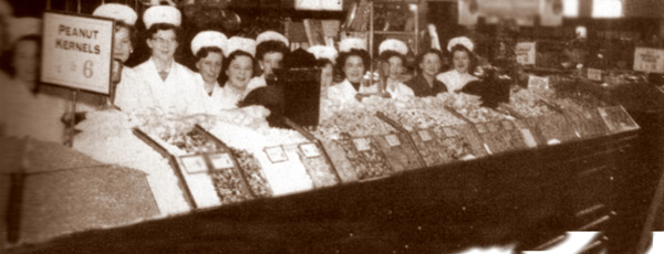 Meet the candy girls who added the sparkle to Woolworths Pic'n'Mix. Woolies had more than 100,000 staff in the 1930s.  Click for a larger version of the picture in a new window.