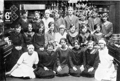 A team shot in front of the Crown Records counter in the F. W. Woolworth store at 123 High Street, Cheltenham, in 1936.